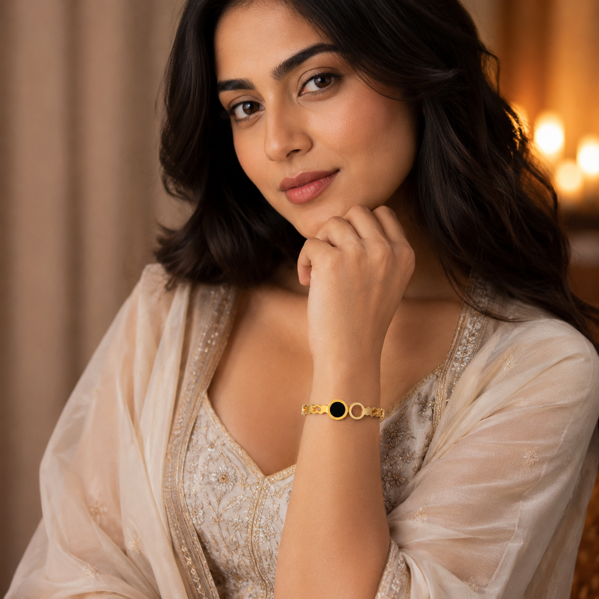 Black disc stainless steel bangle worn with a cream outfit