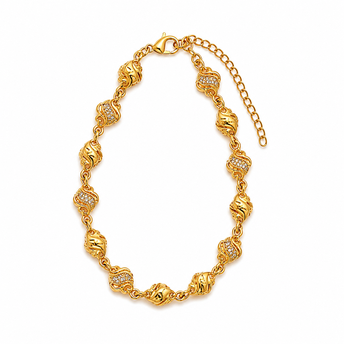 Micro gold-plated wave and sculpted bead bracelet with extender on a white background