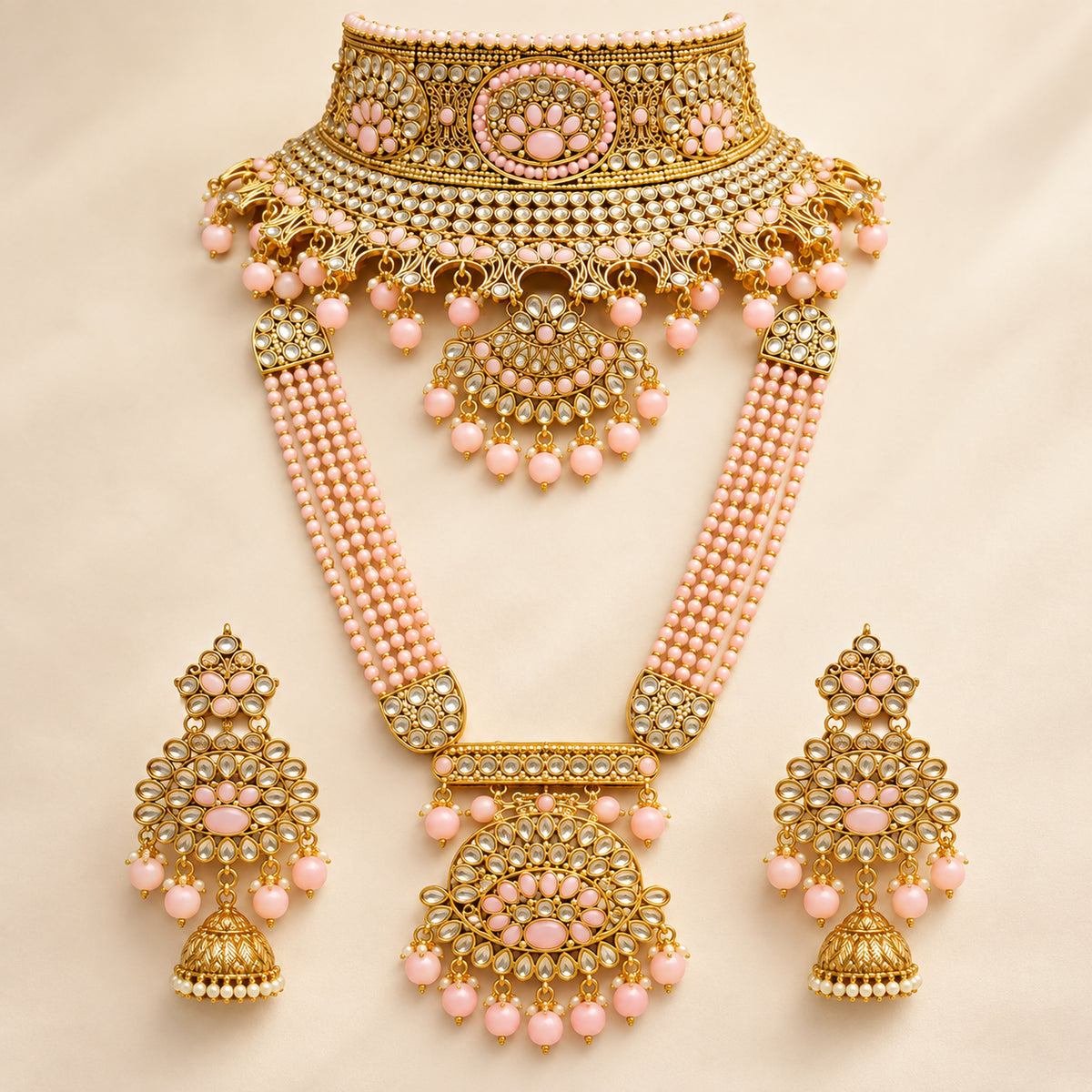 Blush pink floral choker and beaded long haar on a beige bust with matching earrings
