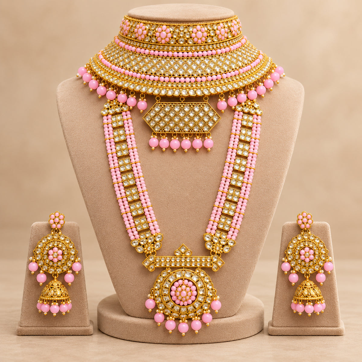 Blush pink lattice choker and round-pendant long haar on a beige bust, jhumka earrings on stands