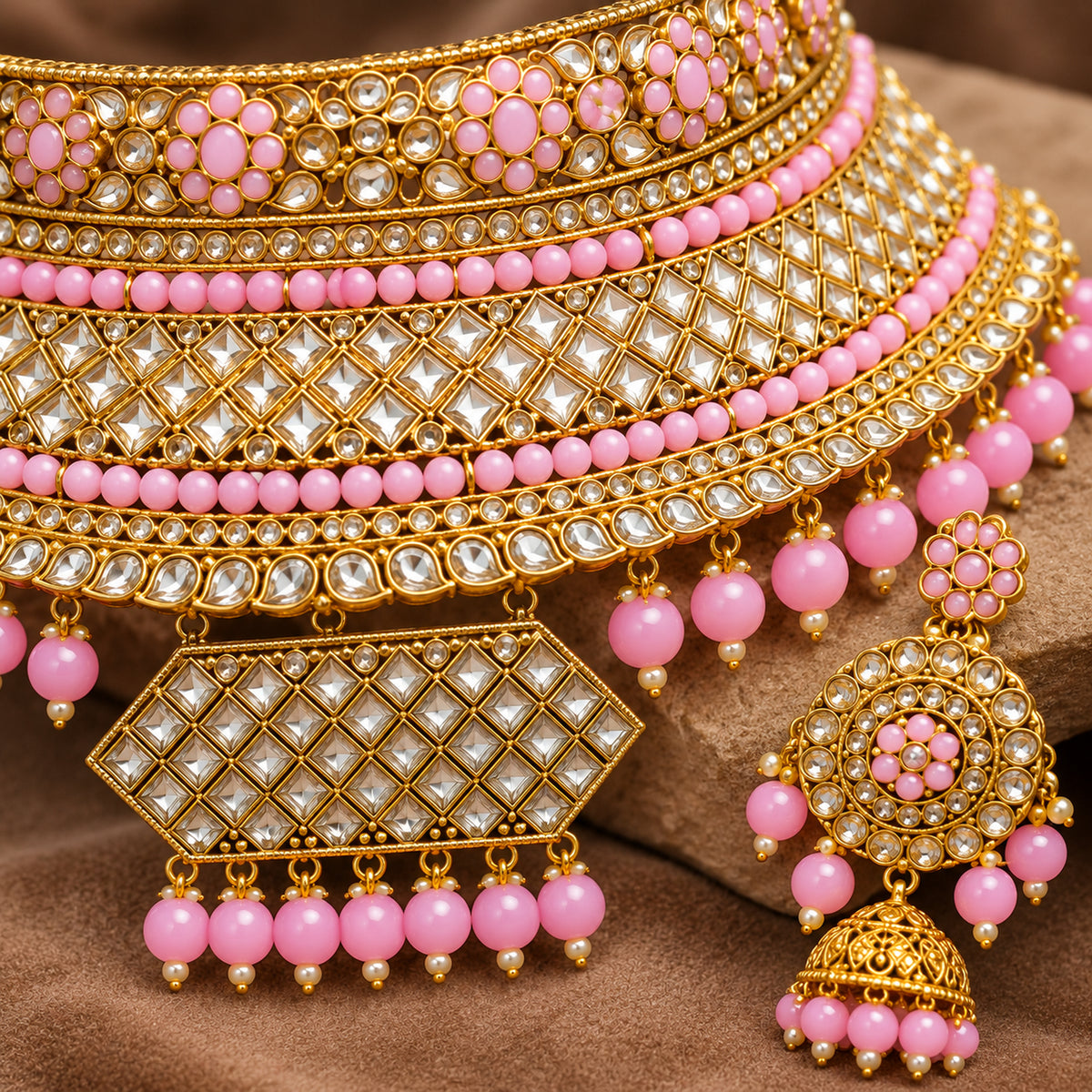 Close-up of the pink flower band, diamond lattice and hexagonal centre ornament with pink drops