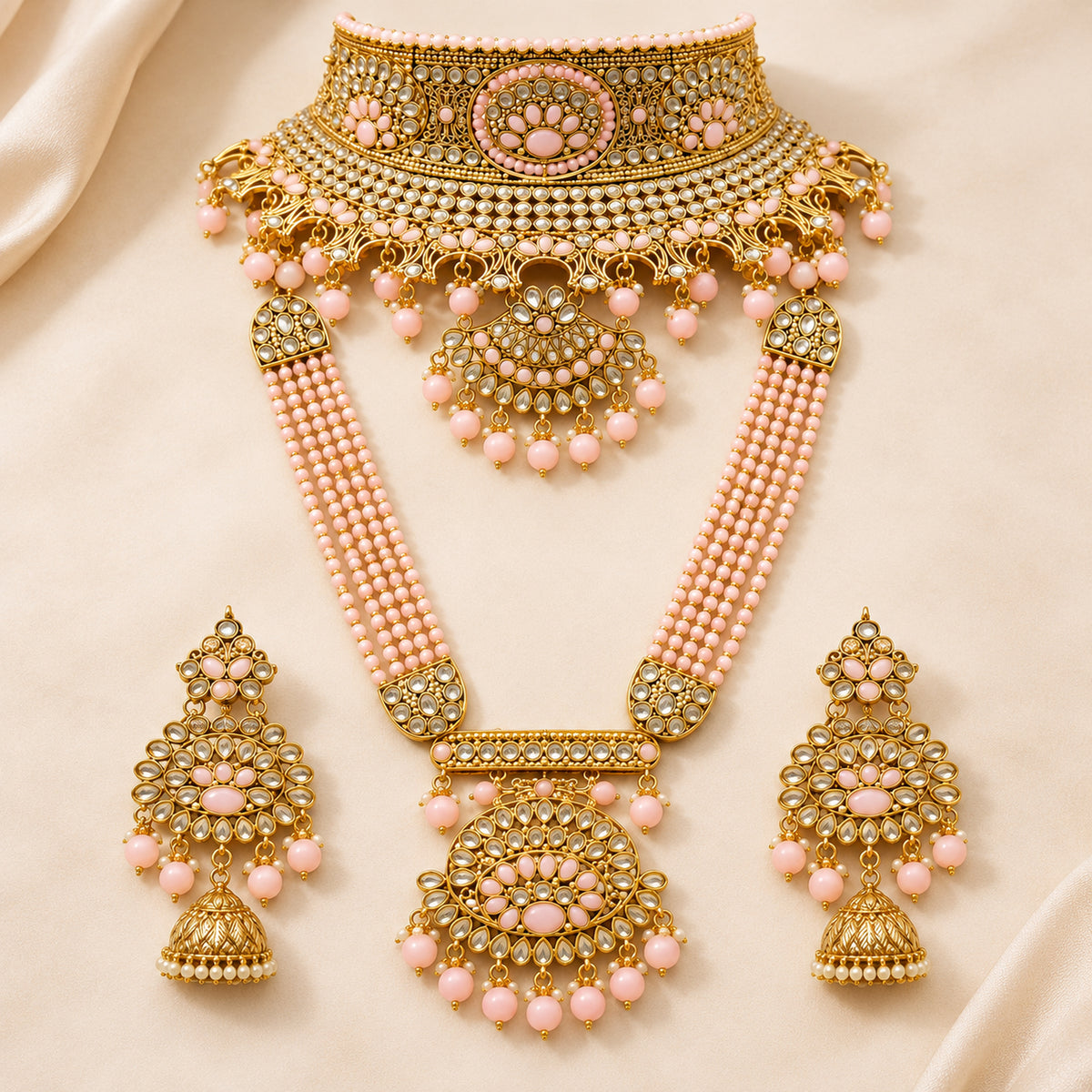 Alternate bust view of the blush pink choker, multi-strand haar and jhumka earrings