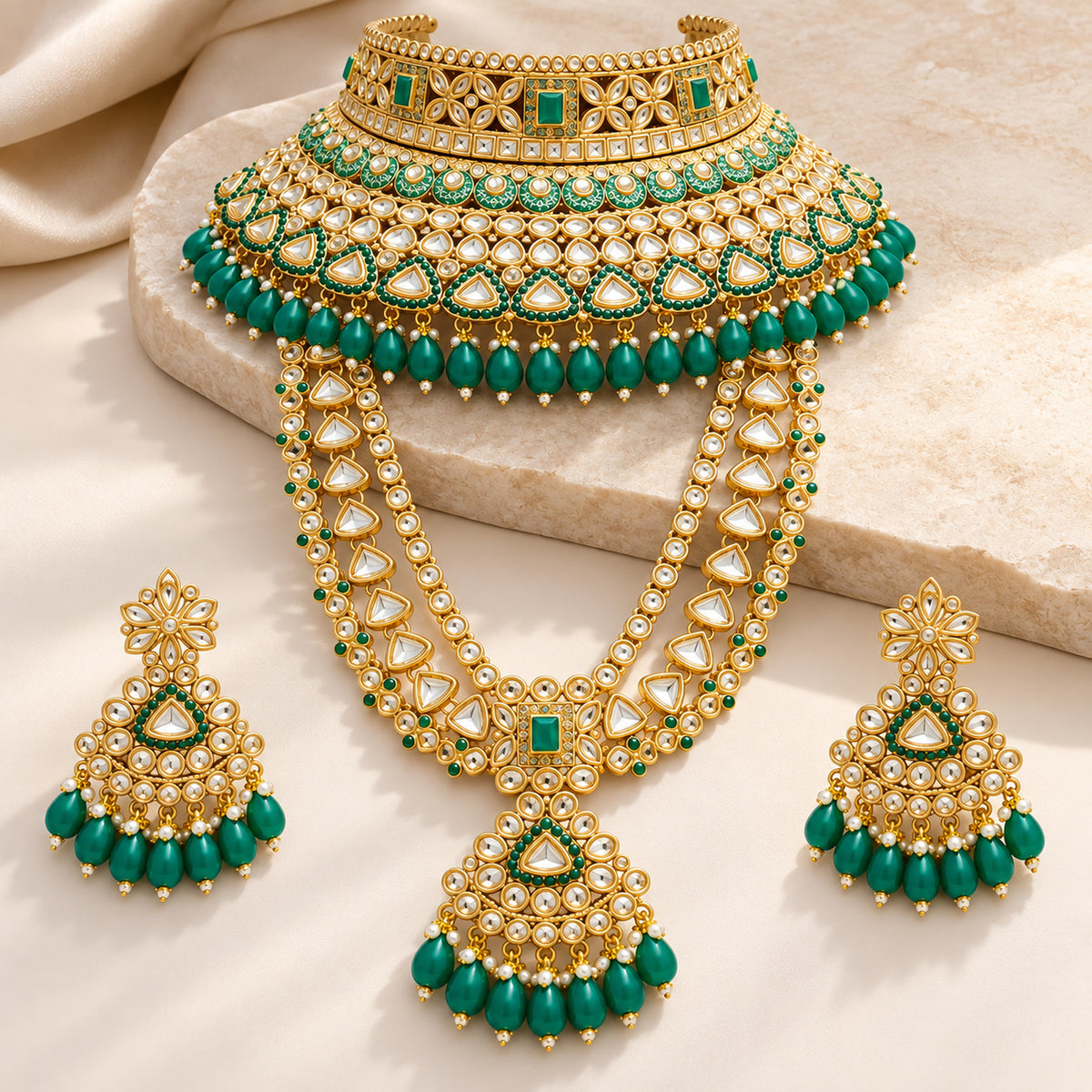 Emerald green choker, long haar and matching earrings on cream fabric