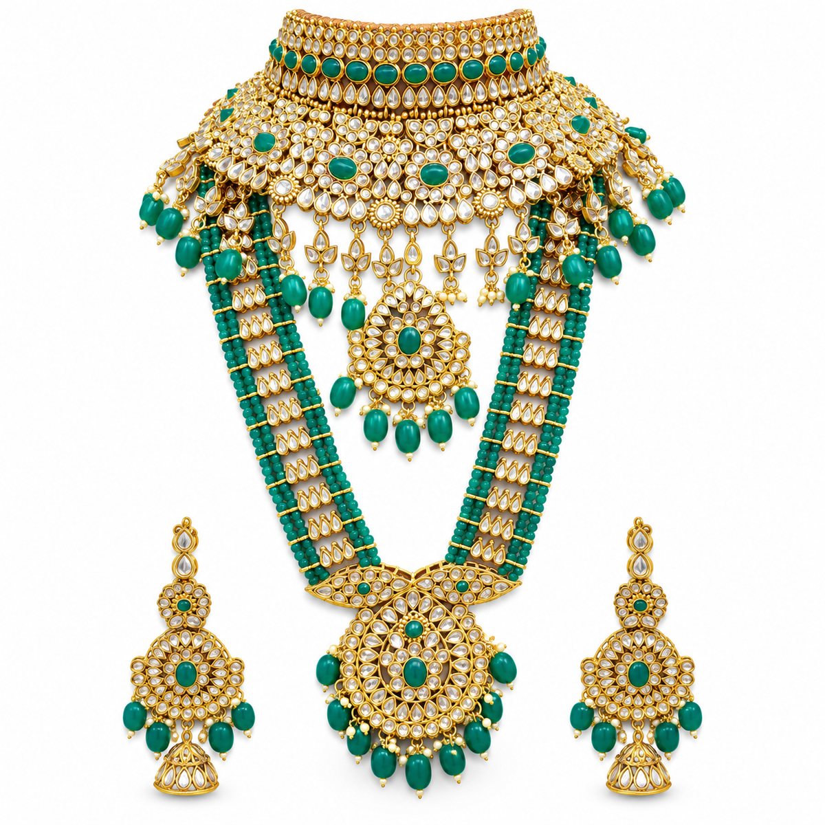 Green Kundan-style bridal jewellery set with medallion choker, long haar and jhumka earrings on white