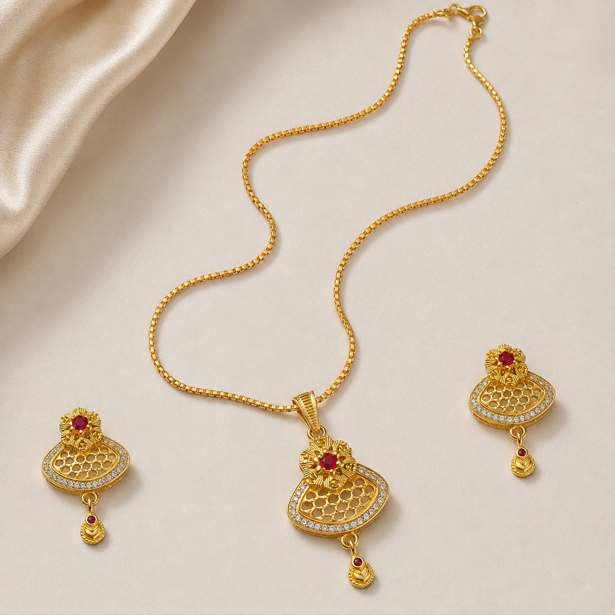 Alternate view of the chain, fan pendant and both earrings laid out together