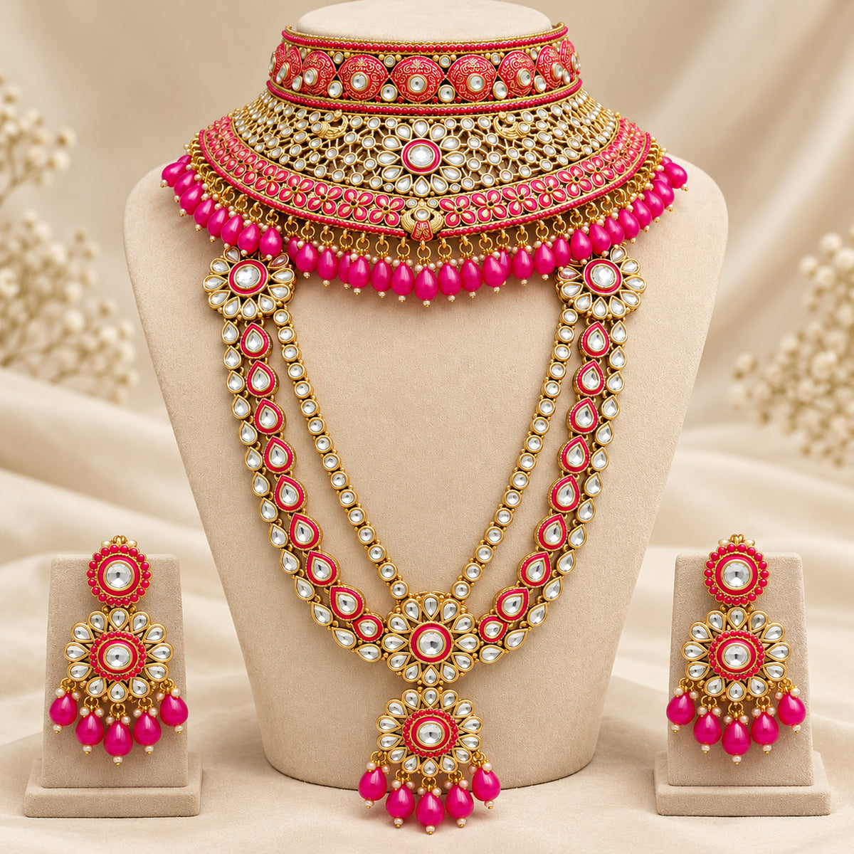 Rani pink choker and long haar displayed on a necklace bust with earrings