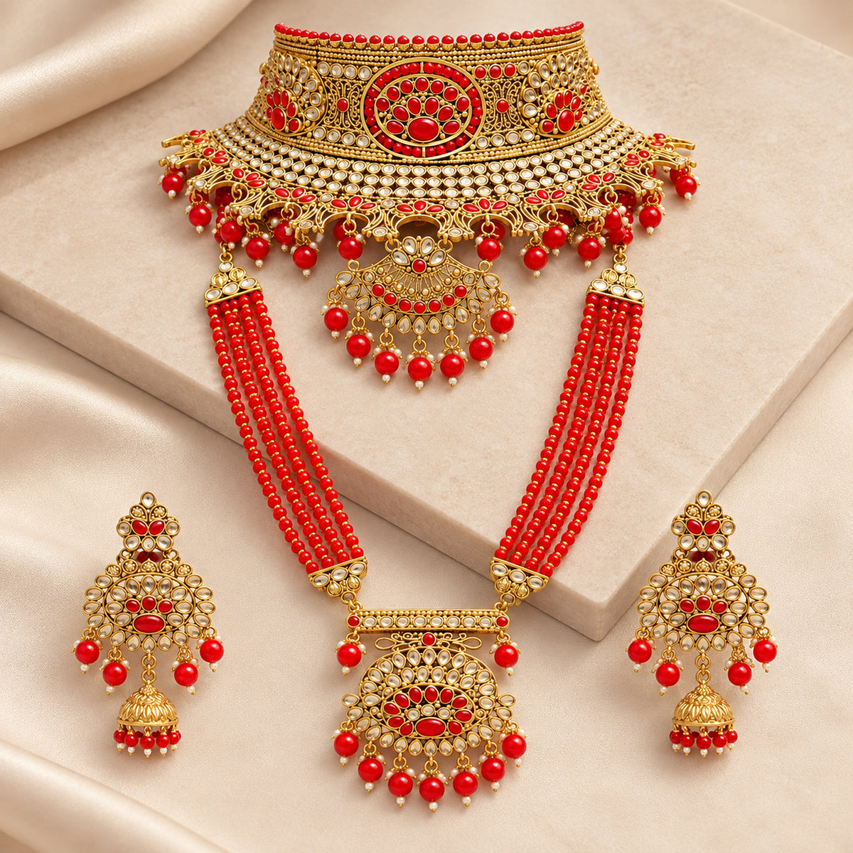 Alternate bust view of the red medallion choker, beaded long haar and matching jhumkas