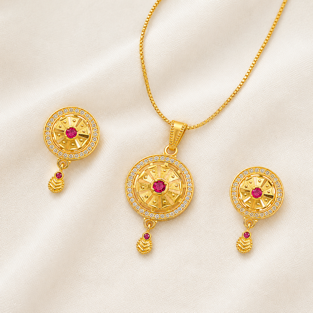 Round sunburst pendant set laid out with its chain and earrings