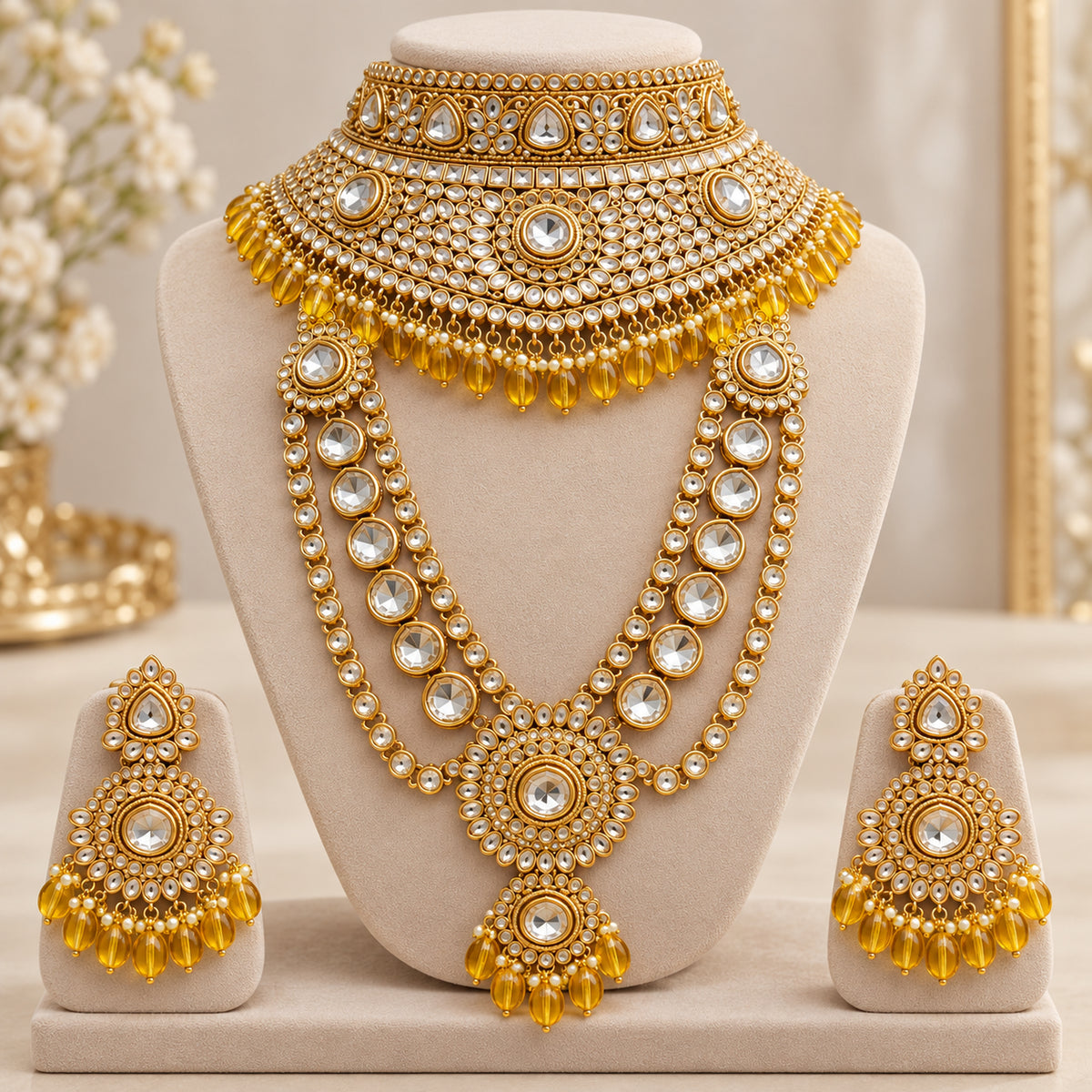 White stone choker, long haar and amber-yellow drop earrings on a display tray