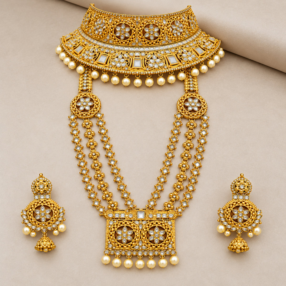 Alternate bust view of the medallion choker, rectangular-pendant haar and earrings