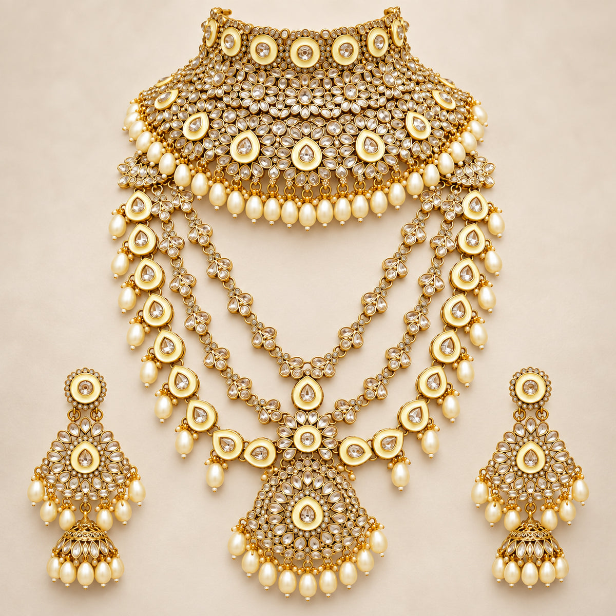 White stone and ivory bead bridal jewellery set arranged on a beige bust with earrings